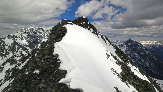 On the summit ridge, ahead is the false summit