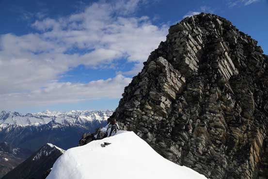 Me approaching the summit block. Photo by Ben