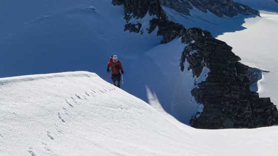 Ben ascending the summit ridge