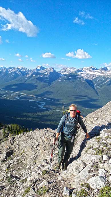 Josh coming up beyond treeline