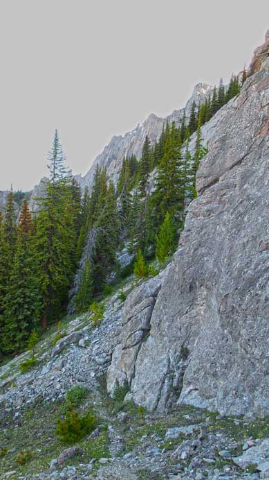 At the first rock face, we'll go down a bit this way