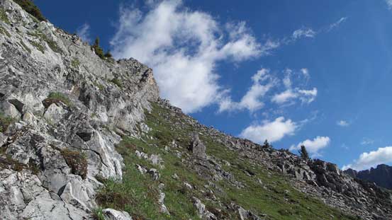 Starting to traverse climber's right side hoping to bypass the crux down-climb