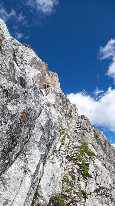 On the long scree ledge, looking upwards.