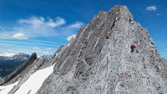 Down-climbing a steep section. Terrain just above Josh was the crux