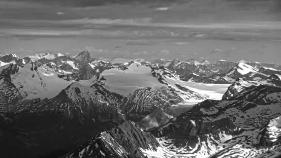 Mt. Forbes poking way behind in the distance. The glaciated peak in foreground is Mt. Collie, another favourite of my