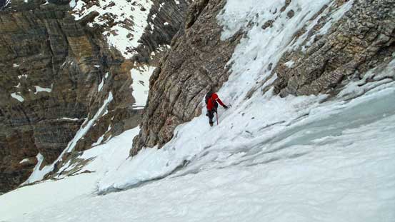 Ben ready to tackle the crux - crossing this ice gully.... This photo looks insane. I don't know how we gathered the courage