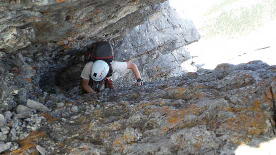 Ben squeezing up this crack/tunnel