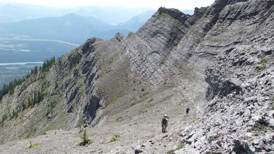 There's a trail on this ledge which will lead us easily back to the ridge