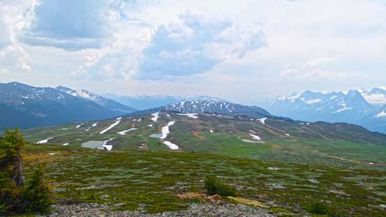 On the summit, looking back at the long and gentle ridge