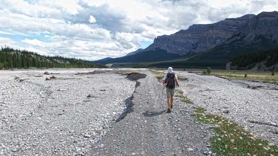 Then walking on the road. It's heavily destroyed by the flood.