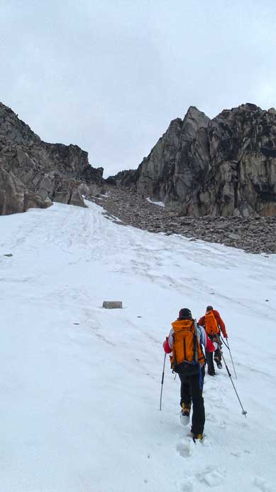 Now, time to grind up this gully. First on snow, then on loose rock.