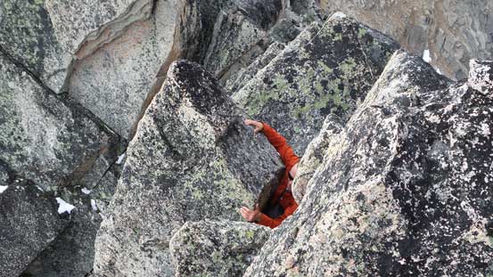 Ben's turn - firstly he had to squeeze through the wall and a rock flake