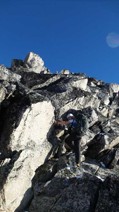 Ben scrambling up the typical terrain on the lower ridge