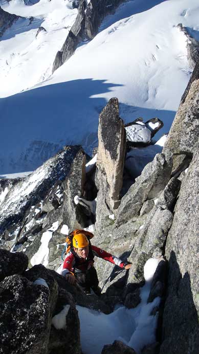 Typical climbing on this 4th/5th class section.
