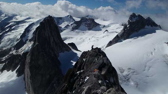 Looking down at Ferenc posing on the ridge. This is the same place as the cover page of Freedom of the Hills.