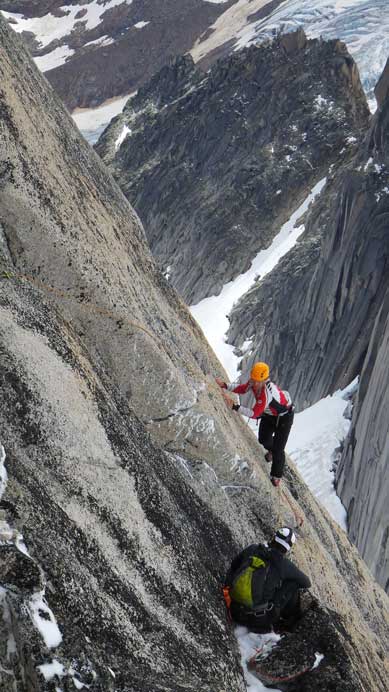Ferenc negotiating the gendarme. He picked a line lower than mine and got at least a finger crack to hands... Note the ice...