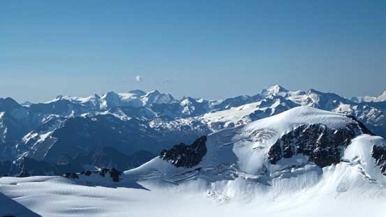 Looking over Howser Peak towards distant Purcell 11,000ers - Jumbo Group (left) and Eyebrow Peak (right)