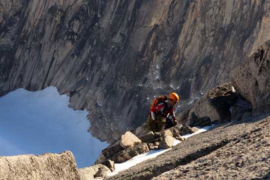 Ferenc topping out on the true summit. Photo by Ben