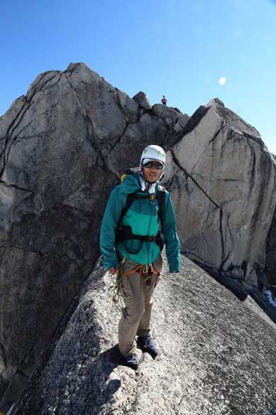 Me balancing over the classic corner slab just below second summit. Photo by Ben