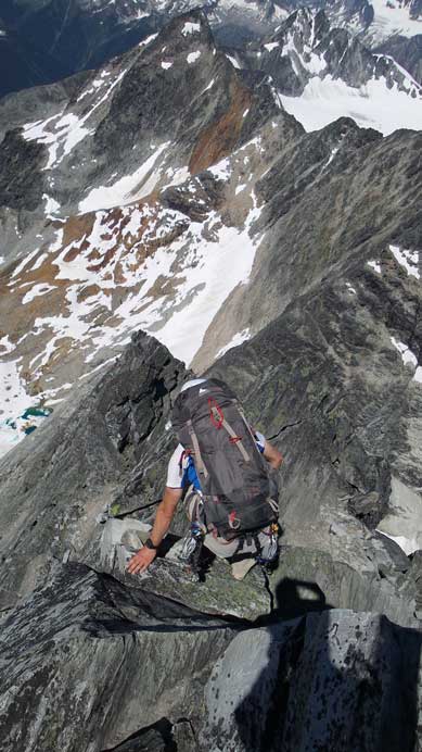 Starting to down-climb the NW Ridge