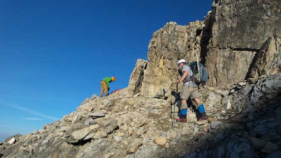 Vern and Eric starting the ledge traverse - wide and easy, not as bad as it looks from afar