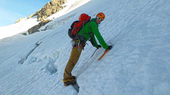 Vern crossing a bergschrund. Staying on climber's right could avoid it entirely.