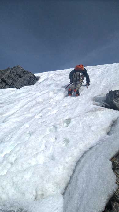 Ben climbing down a steep step