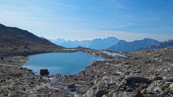 This alpine tarn would be a three star bivy spot. If you objective is only Prince George then I'd suggest going all the way to here.