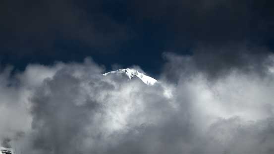 The snowy summit of Robson poking through - makes it looking like a Himalayan giant