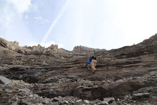 Me picking my way up. Photo by Ben