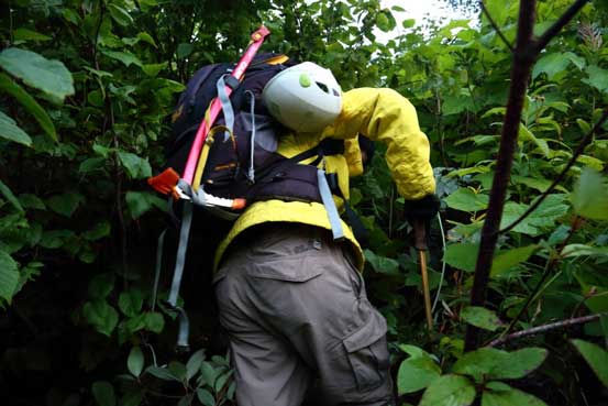 Me bushwhacking... Photo by Ben
