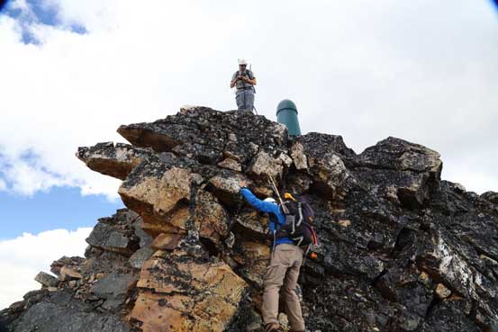 Me ascending back the crux. Photo by Ben