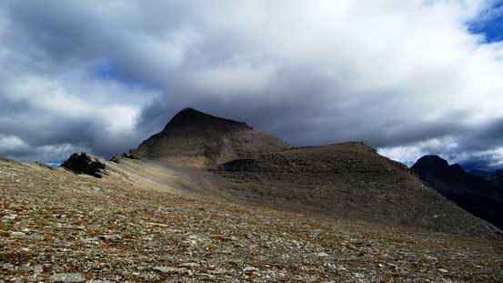 Veering right and slogging up a pile of scree, we started to see Mt. Folk