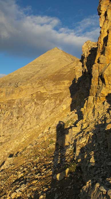 Traversing around a corner, the true summit ahead