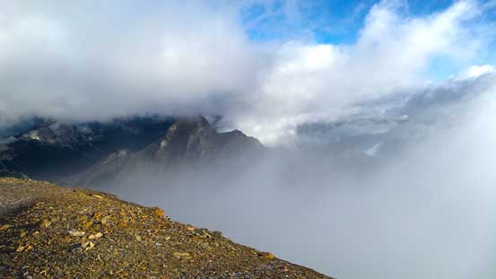 On the summit now, Mt. Splendid barely visible between the clouds
