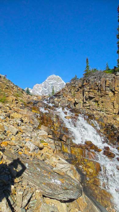 A neat waterfall on the approach, Mt. Woolley behind