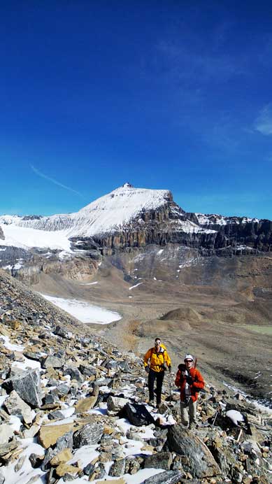Vern and Ben slogging up, with Mushroom Peak behind - our last objective in this trip