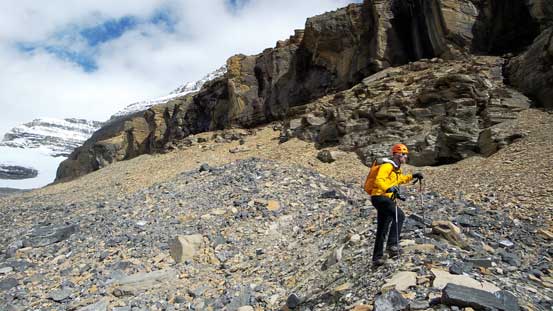 Vern kept traversing under the imposing cliff band.