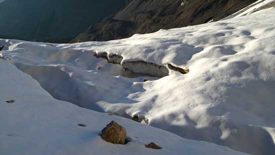 The same bergschrund. We had to traverse on thin snow covered hard dirt/ice just above it (don't slip)!