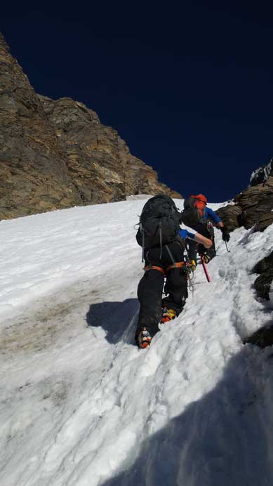 Vern and Ben kicking step up the couloir. At places it's actually post-holing...