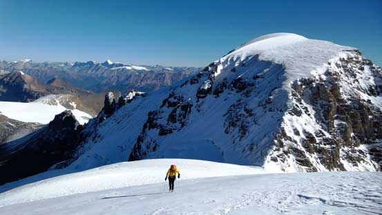 Vern ascending the north glacier, with Diadem Peak behind - our next objective