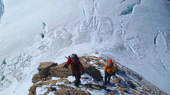 Ben and Vern ascending Diadem Peak. In the background is Woolley's crevasses...