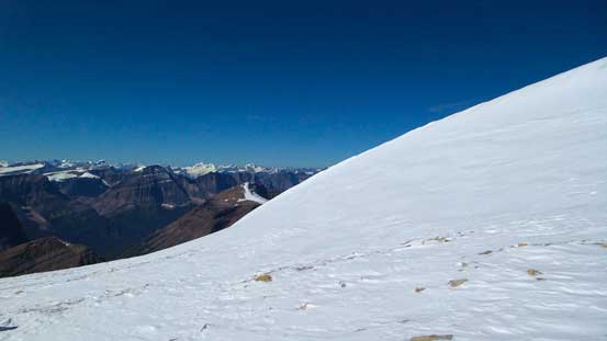This snow hump would be the false summit. 