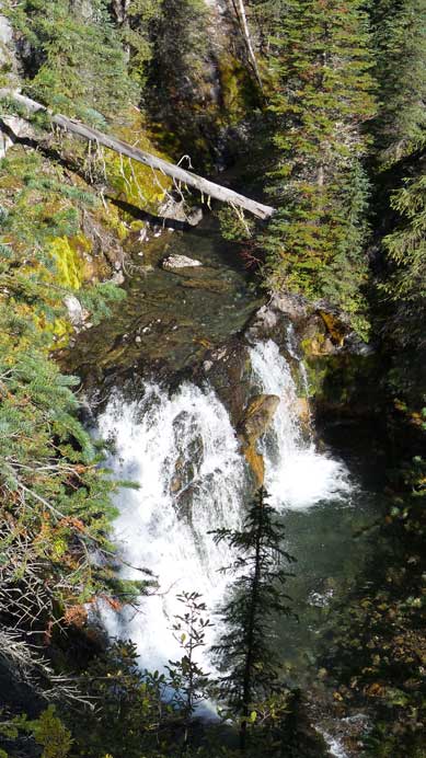 A mini-waterfall in a deep canyon.