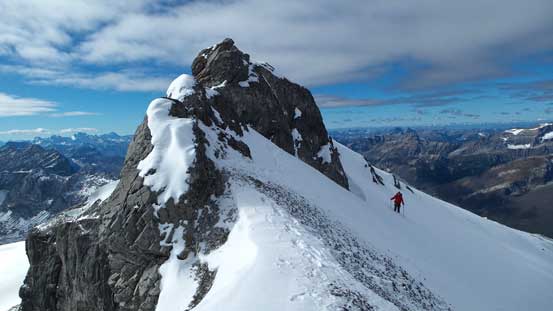 Mike decided to post-hole and side-hill across its base.