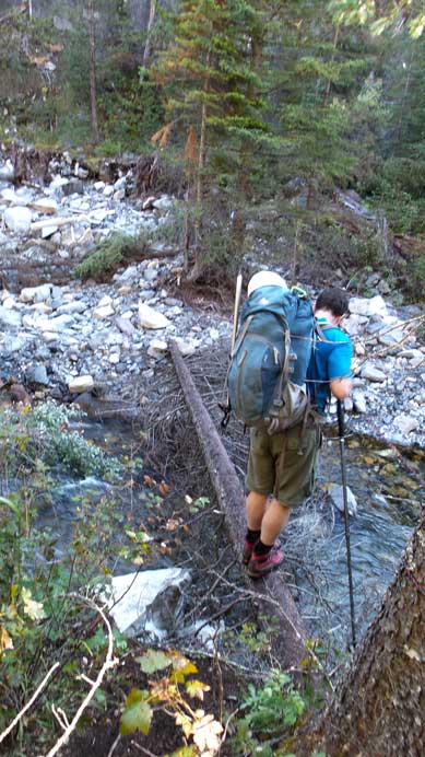 Back to the sketchy log. I ended up putting crampons on - to justify the purpose of hauling them up anyway...