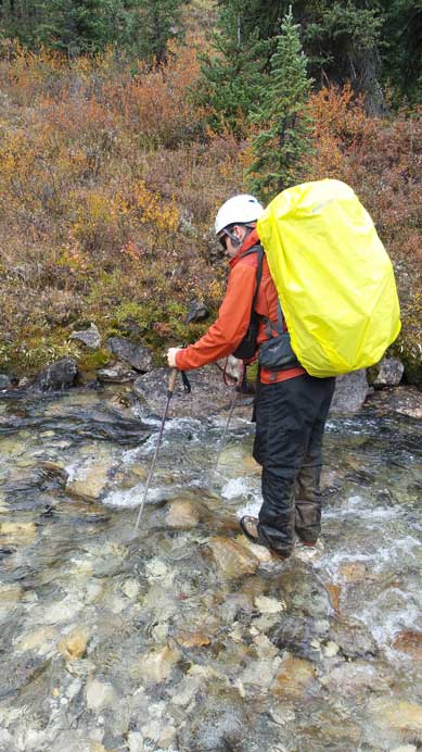 Ben trying to cross Pipestone River without taking his boots off. After watching him struggling I decided to just ford it. 