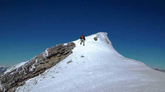 Ben down-climbing a steeper roll
