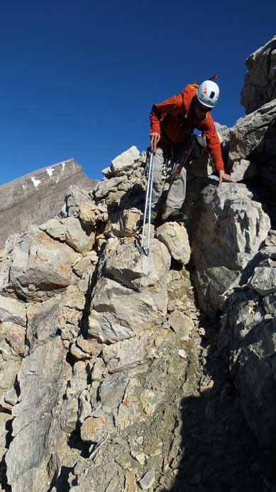 Down-climbing the difficult step to drop into the cirque