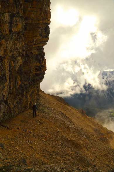 Me traversing around the false summit on the way back. Photo by Ben